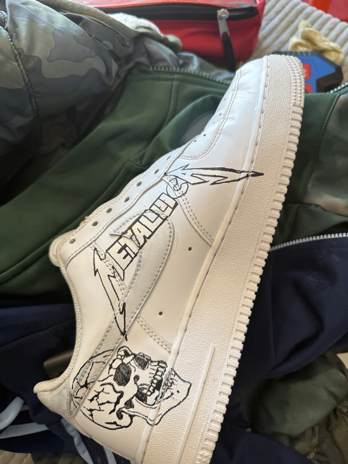 Custom sneaker artwork during line work stage