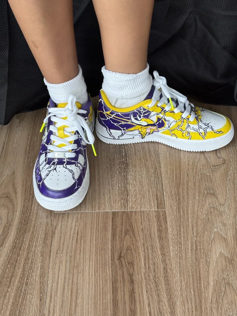 Front view showing the laces and hand-painted Vikings artwork